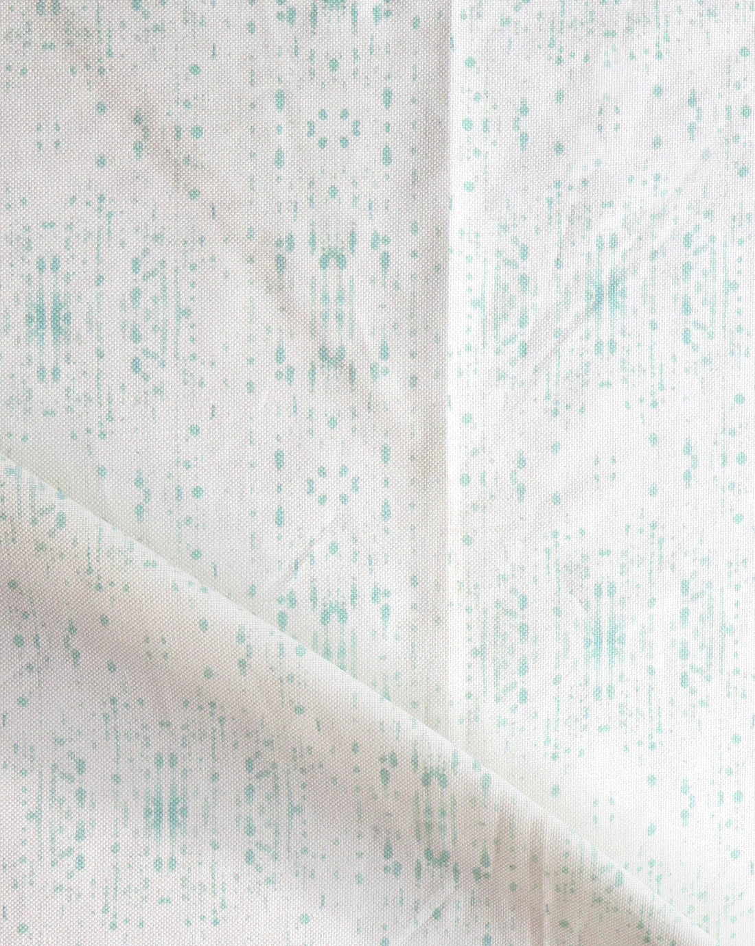 linen-fabric-omaha-kinship-breeze-green-eskayel-fold-web.webp